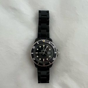 ToyWatch Women's Black Dial Plasteramic Adjustable Band